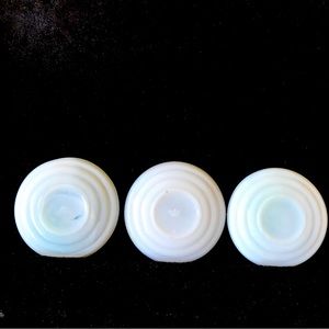 Lot of 5 milk glass canning jar lids.